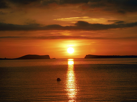 Puesta de sol sobre Cala Conta