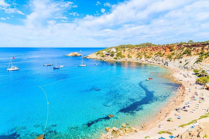 View of Cala d'Hort beach with beautiful azure blue sea water, Ibiza island, Spain